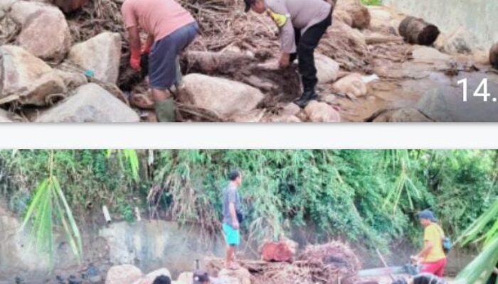 Personil Polres Sibolga Bersama Warga Bersihkan Sungai Aek Doras