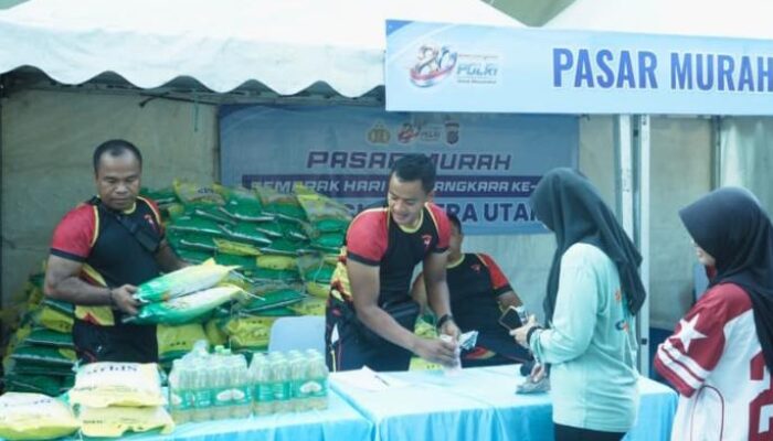 Brimob Polda Sumut Bagikan Makanan Gratis di Medan